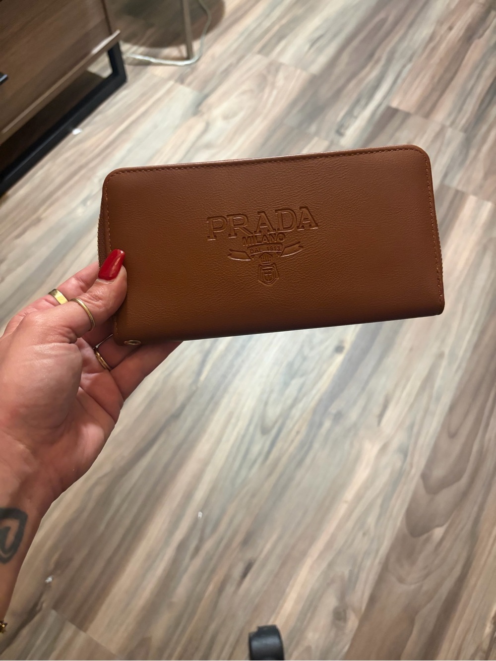 Prada Brown Leather Zip Wallet with Embossed Logo